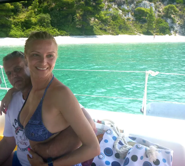 A couple on board by the beach
