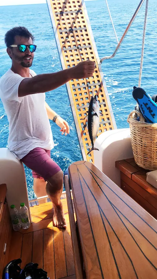 A crew member at the bow