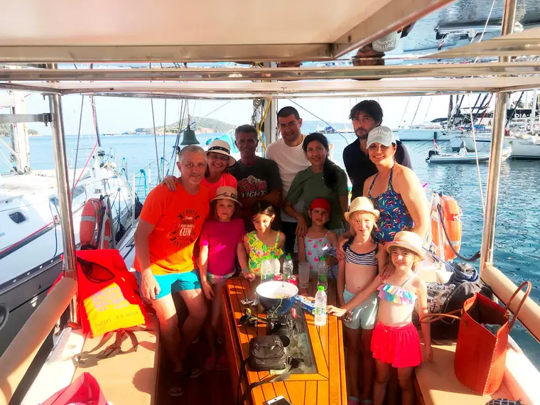 A family on board in the marina