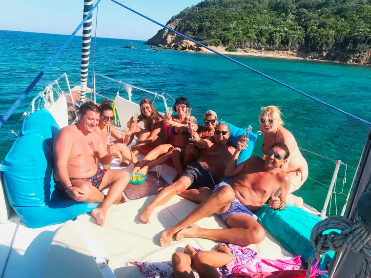 A group relaxing on the foredeck