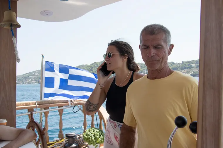 At the stern with the Greek flag