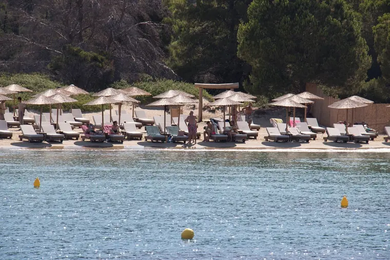 Beach umbrellas across the water