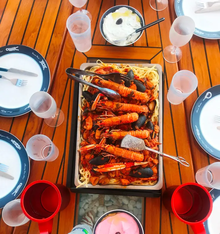 Grilled prawns served on board