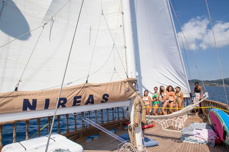 Guests below the NIREAS sail cover
