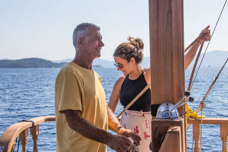 Sharing a laugh at the mast