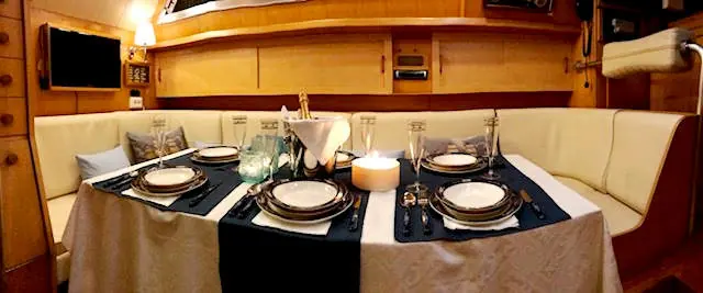 The saloon table set for dinner