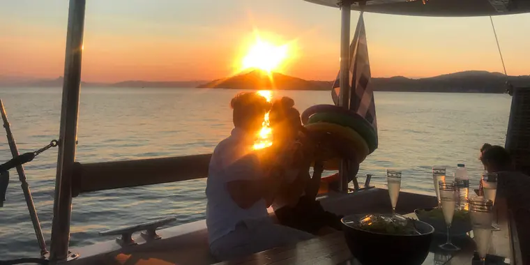The sun setting over the sea