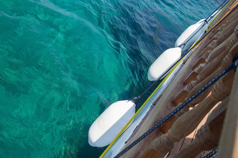 Turquoise water along the hull