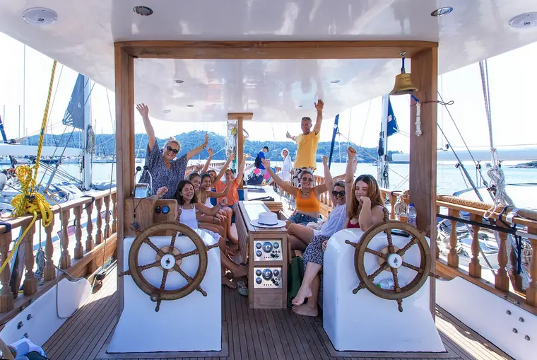 Waving from the cockpit before sailing
